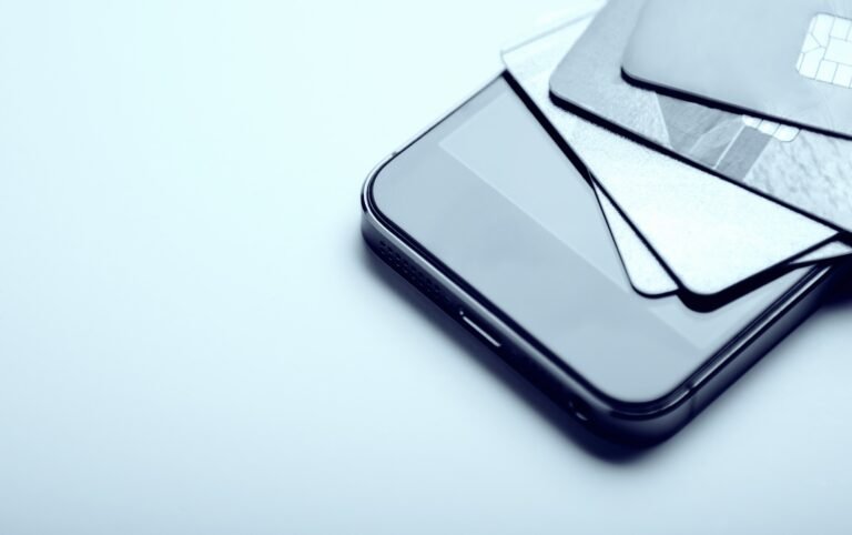 Credit cards on the phone. Online money, e-commerce